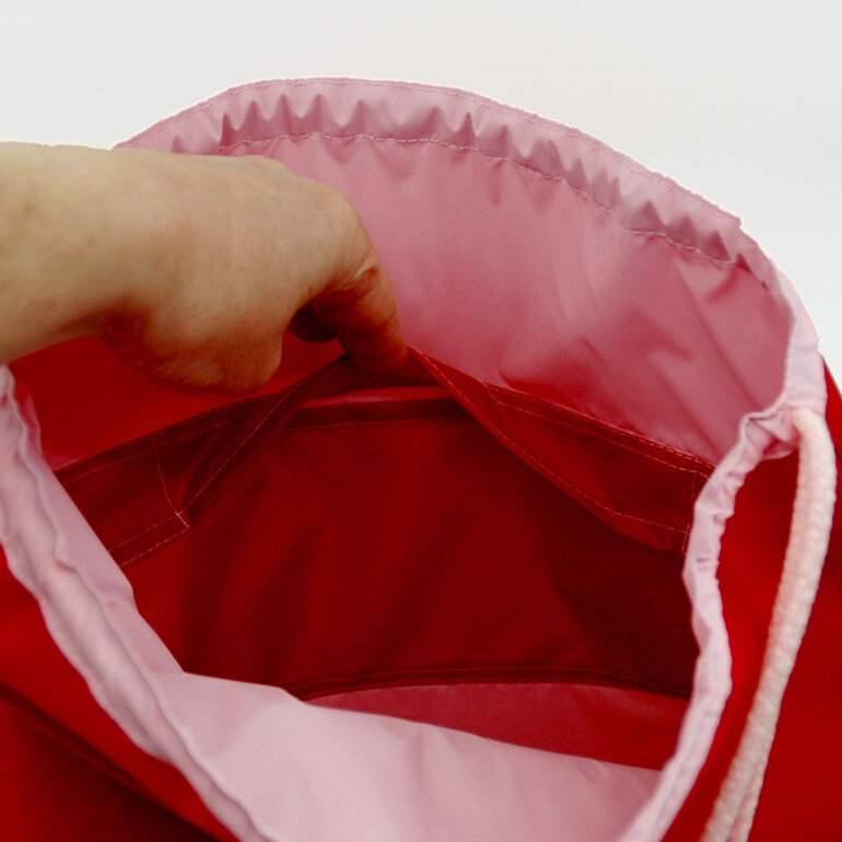 swim pouch red with light pink contrast showing pocket inside bag