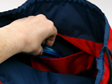 swim pouch red with navy contrast showing pocket inside bag in use