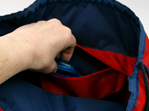swim pouch red with navy contrast showing pocket inside bag in use