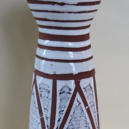 Terracotta with a heavy white glaze