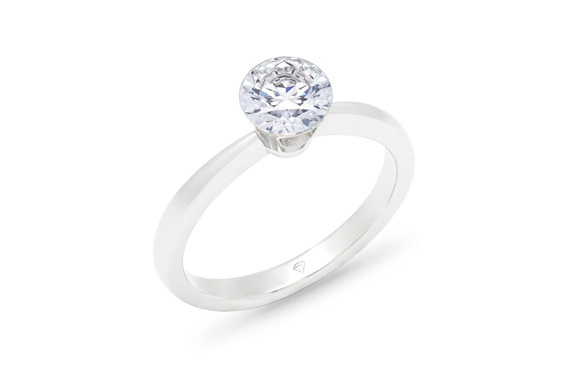 The Floeting Diamond: Floating diamond solitaire engagement ring platinum