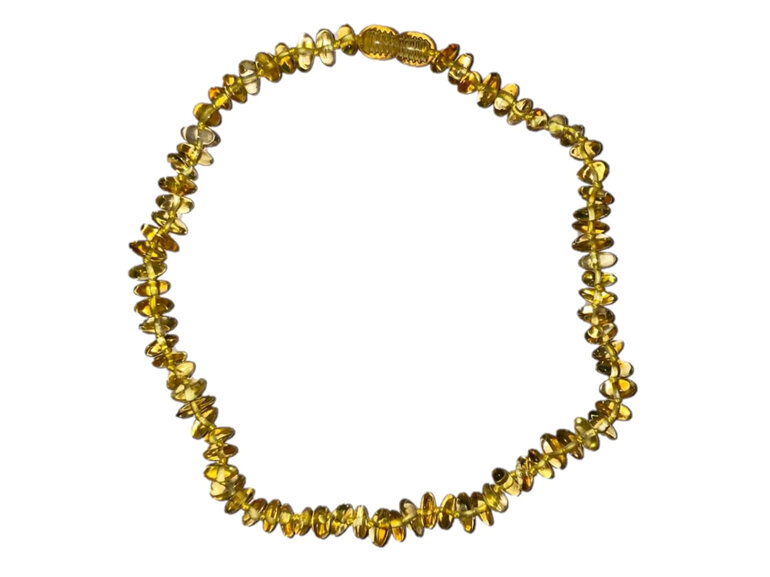 This natural amber teething necklace not only looks super cute, but its amber be