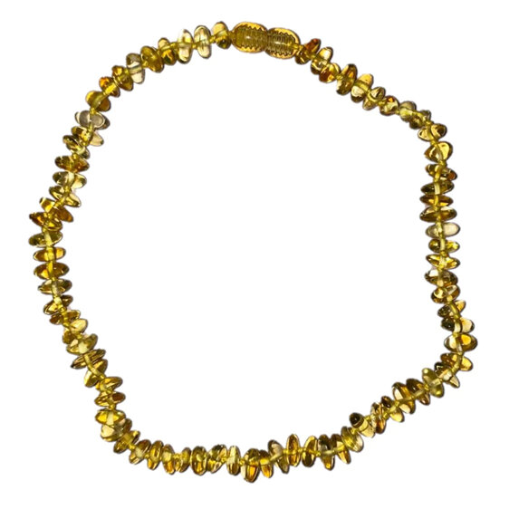 This natural amber teething necklace not only looks super cute, but its amber be