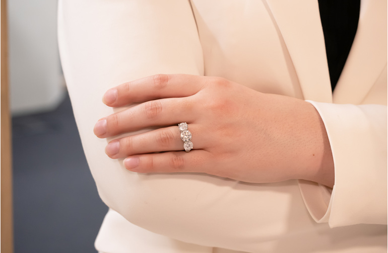 three stone detailed diamond engagement ring, platinum