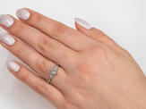 Three stone diamond engagement ring on hand celtic inspired design milgrain