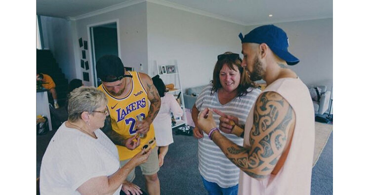 TJ Perenara with cousin Byron, mother and grandmother, showing off their rings