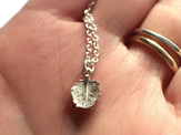 tui tuft tiny delicate feather lightweight sterling silver necklace pendant
