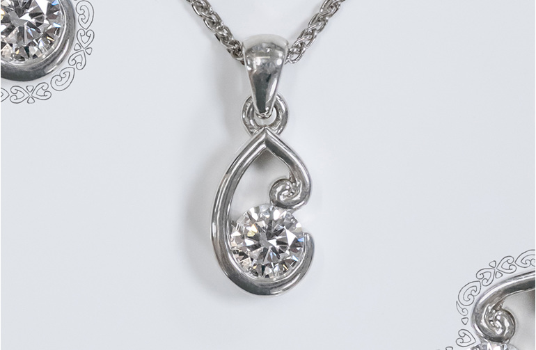 Tupu koru new life diamond solitaire pendant platinum maori jewellery