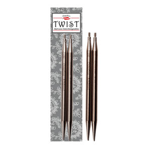 Twist interchangeable needle tips in package and another set beside