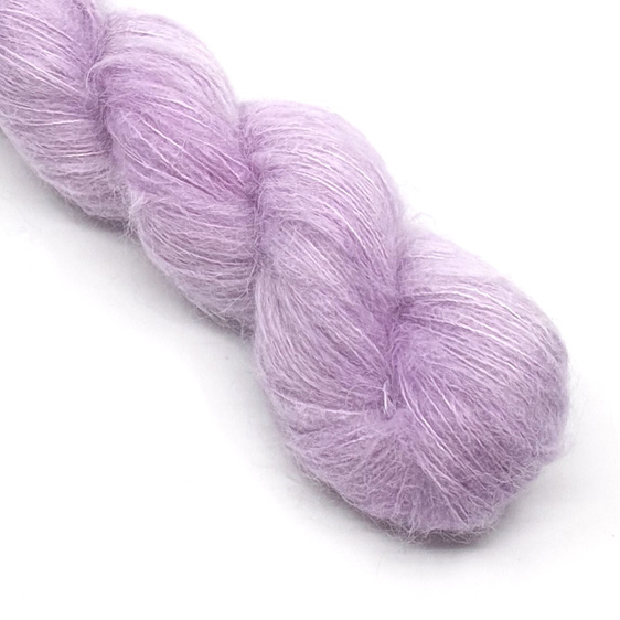 twisted skein of 2ply fluffy suri alpaca and silk in lilac hues