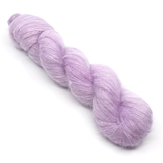 twisted skein of 2ply fluffy suri alpaca and silk in lilac hues