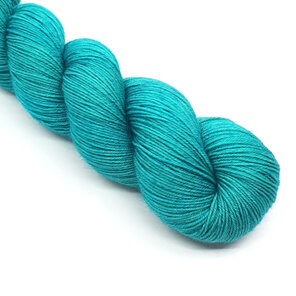 twisted skein of  4ply Bluefaced Leicester in turquoise green hues