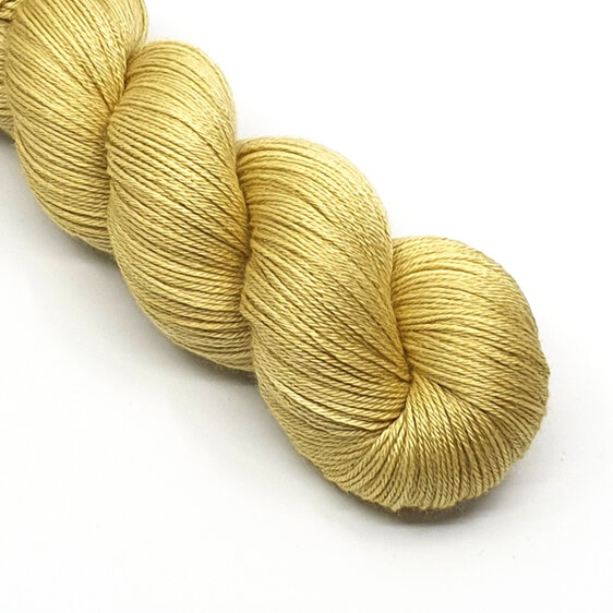 twisted skein of 4ply merino/nylon in ginger hues