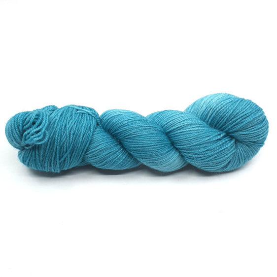 twisted skein of 4ply wool in teal hues