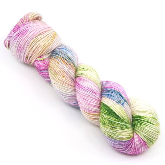 twisted skein of variegated yarn in pink, yellow, blue, green, lilac