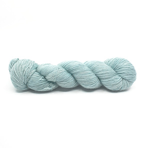 Twisted skein of yarn in lightest teal
