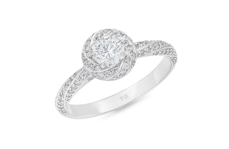 Twisted spiralling halo diamond engagement ring design