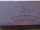 Unicorn darts bakelite box