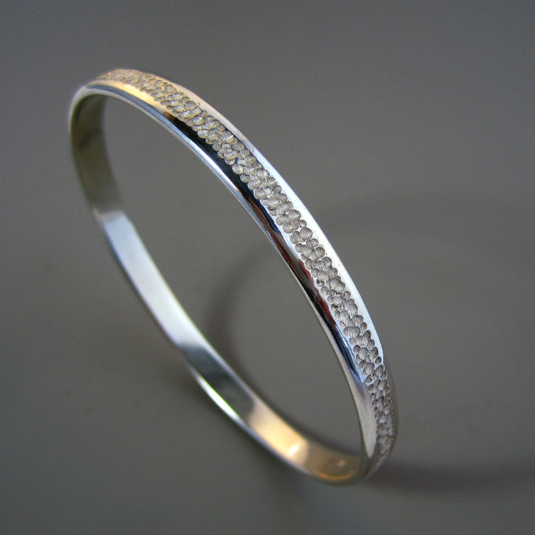Vapour hand engraved sterling silver bangle