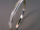 Vapour hand engraved sterling silver bracelet