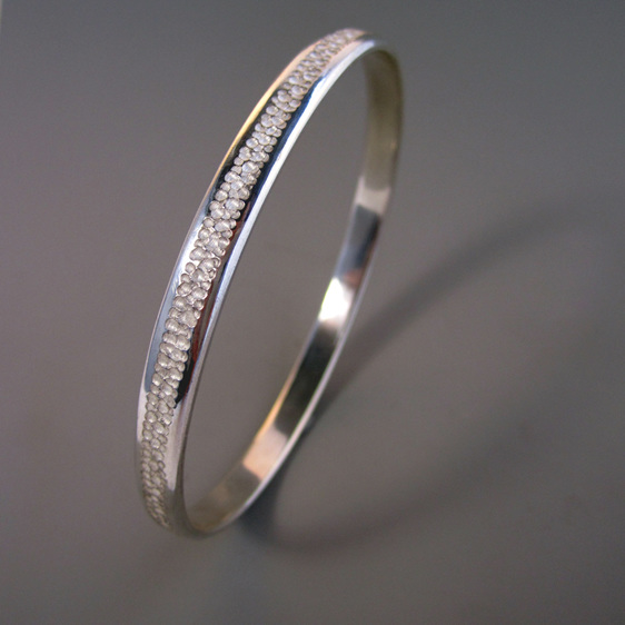 Vapour hand engraved sterling silver bracelet