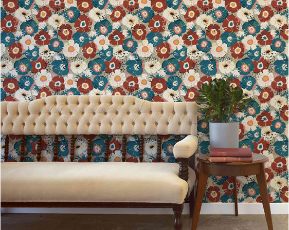 Vintage floral wallpaper with velvet couch, side table and plant
