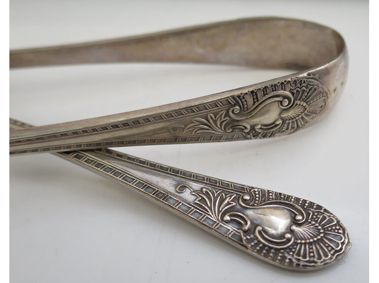 Vintage teaspoons and tongs