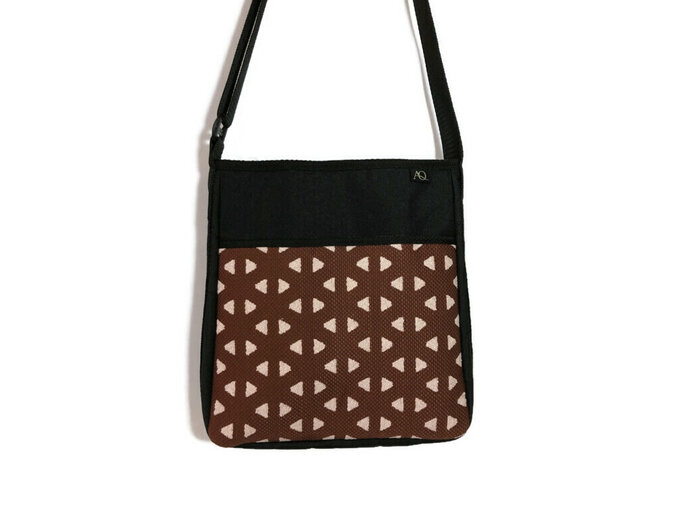 Womens handbag in a rust and dusky pink fabric, suitable for everyday living.