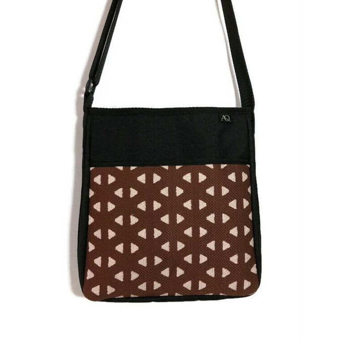 Womens handbag in a rust and dusky pink fabric, suitable for everyday living.
