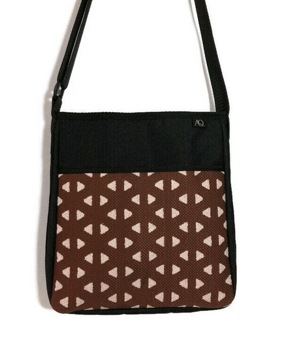 Womens handbag in a rust and dusky pink fabric, suitable for everyday living.