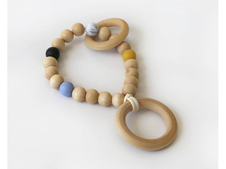 Wooden teether designed and handmade with wood and silicone in Auckland, NZ