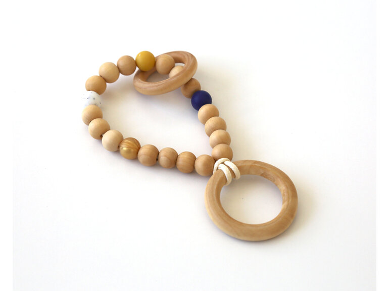 Wooden teether designed and handmade with wood and silicone in Auckland, NZ