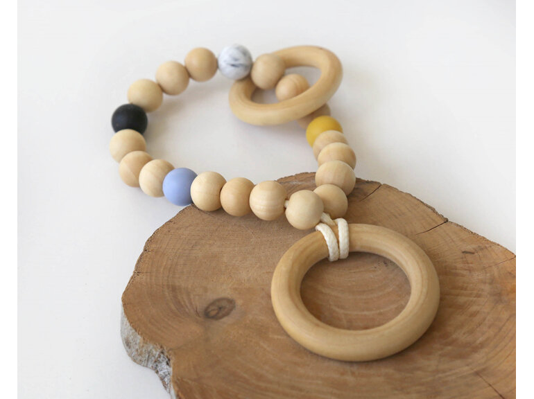 Wooden teether designed and handmade with wood and silicone in Auckland, NZ