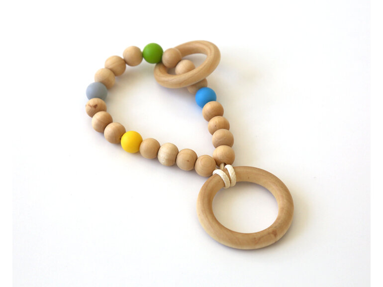 Wooden teether designed and handmade with wood and silicone in Auckland, NZ