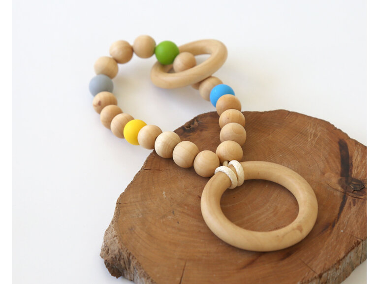 Wooden teether designed and handmade with wood and silicone in Auckland, NZ