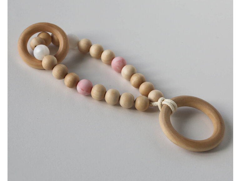 Wooden teether designed and handmade with wood and silicone in Auckland, NZ