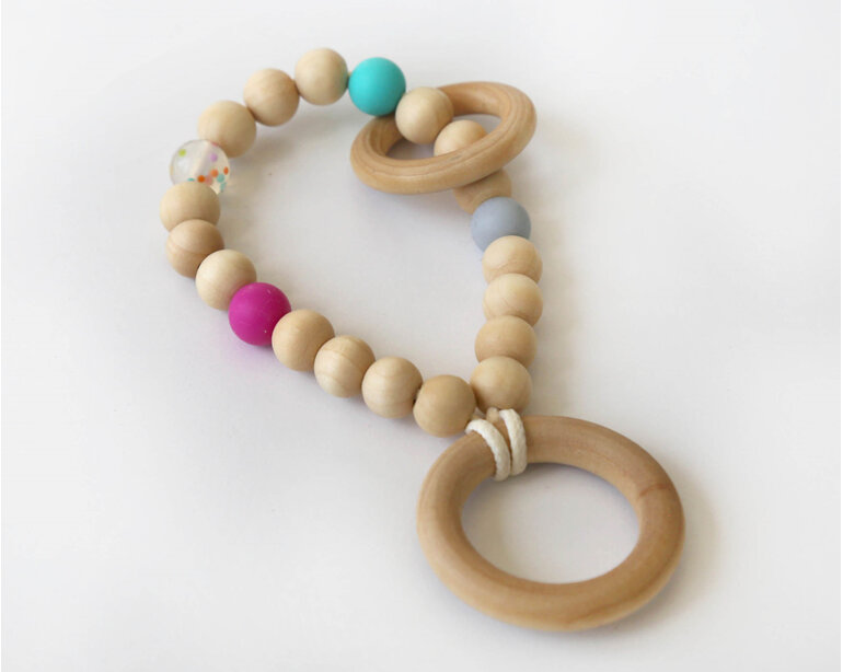 Wooden teether designed and handmade with wood and silicone in Auckland, NZ