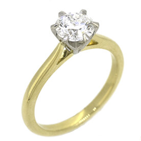Yellow gold and platinum round brilliant diamond solitaire engagement ring